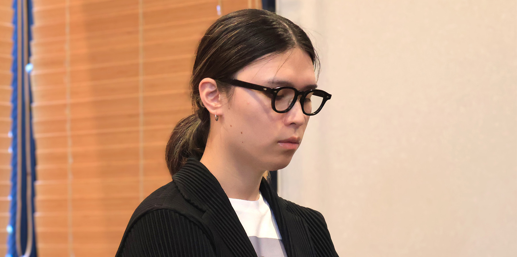 インタビューに答える田中 敦也